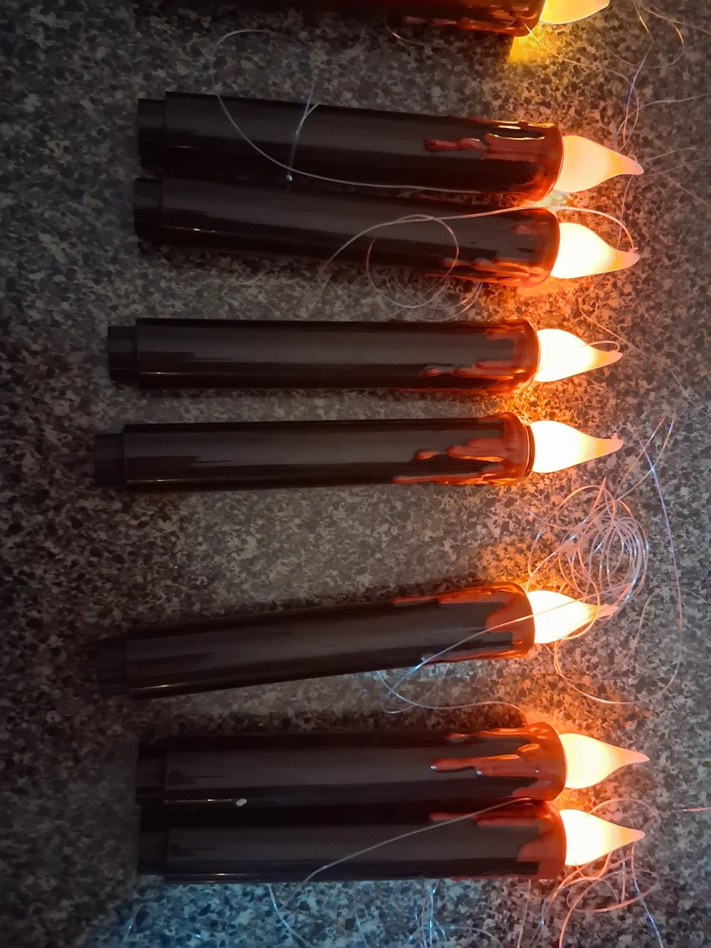 String of Black LED Candle Lights with Warm Amber Flames